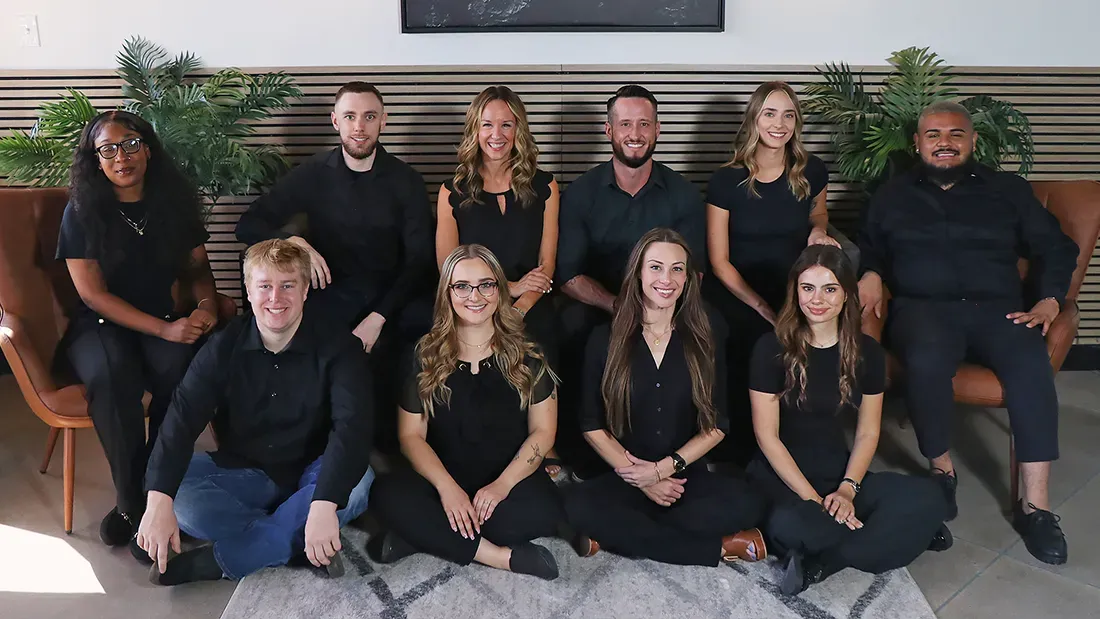 The Axis Spine and Sport team posing for a group photo