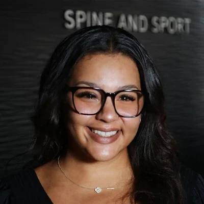 A headshot photo of Kaylee, a chiropractic assistant at Axis Spine and Sport