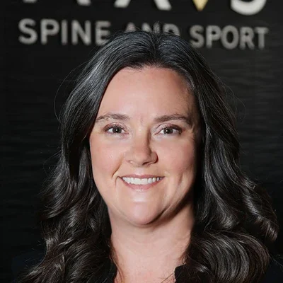A headshot photo of Meghan, the personal injury director at Axis Spine and Sport