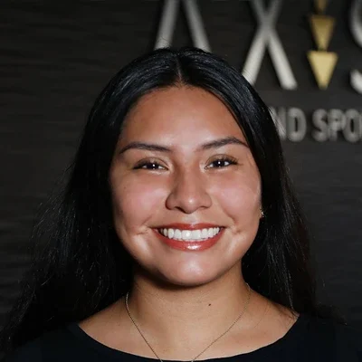 A headshot photo of Kiana, a front desk receptionist at Axis Spine and Sport