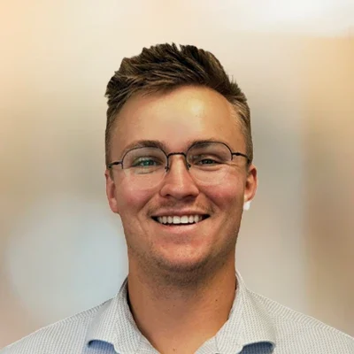 A headshot photo of Dr. Colling Jensen