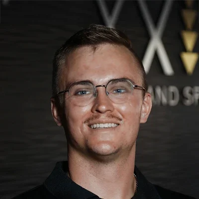 A headshot photo of Dr. Collin Jensen, a chiropractor at Axis Spine and Sport